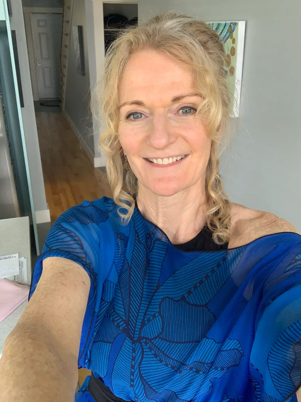 Ginger Canning, smiling, at home in natural light